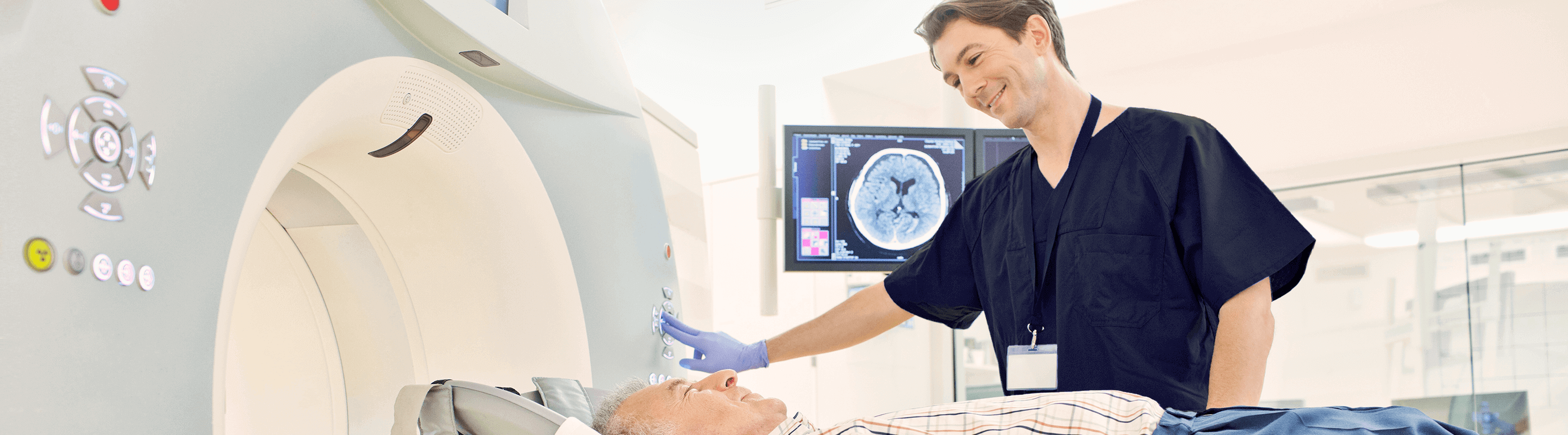 hero-1.2.2-ctscans-dt (1) (1) A Doctor performing a CT scan